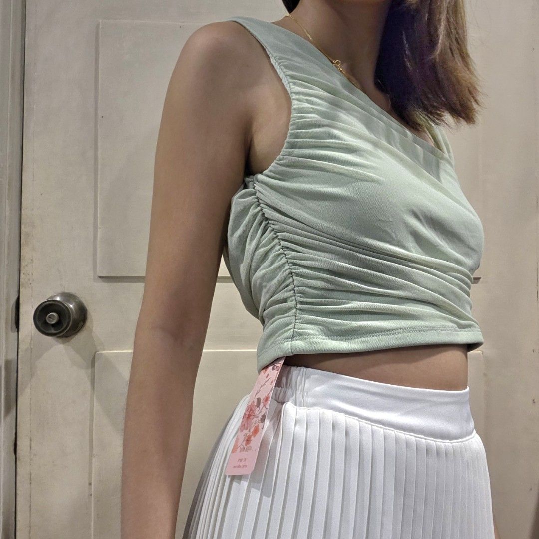 Light Green Asymmetrical Top (Category: Others Tops) located in Quezon City. Submitted by anirbash (Listing ID 1388840236, Image 3). Description: Light Green Asymmetrical Top - Brand New only worn for photo - Size Small - Location: Tomas Morato, QC - BPI or Gcash Payment - Meet up or shipping via Lalamove/J&t/Grab/Angkas.