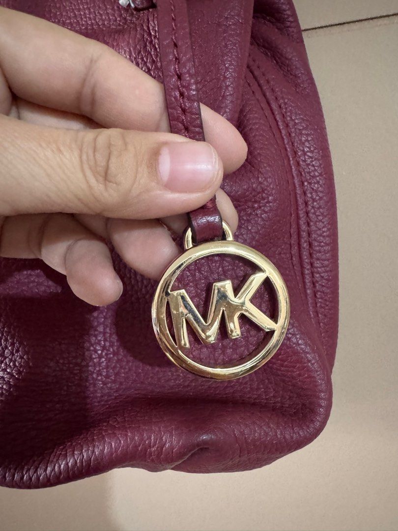 MK Two Way Bag (Category: Luxury Bags & Wallets) located in Mandaluyong City. Submitted by saffronaleximichiko (Listing ID 1388784039, Image 2). Description: MK Two way bag - original with paper and dust bag Many comparments Used 2-3x lang RFS: too many bags I have.