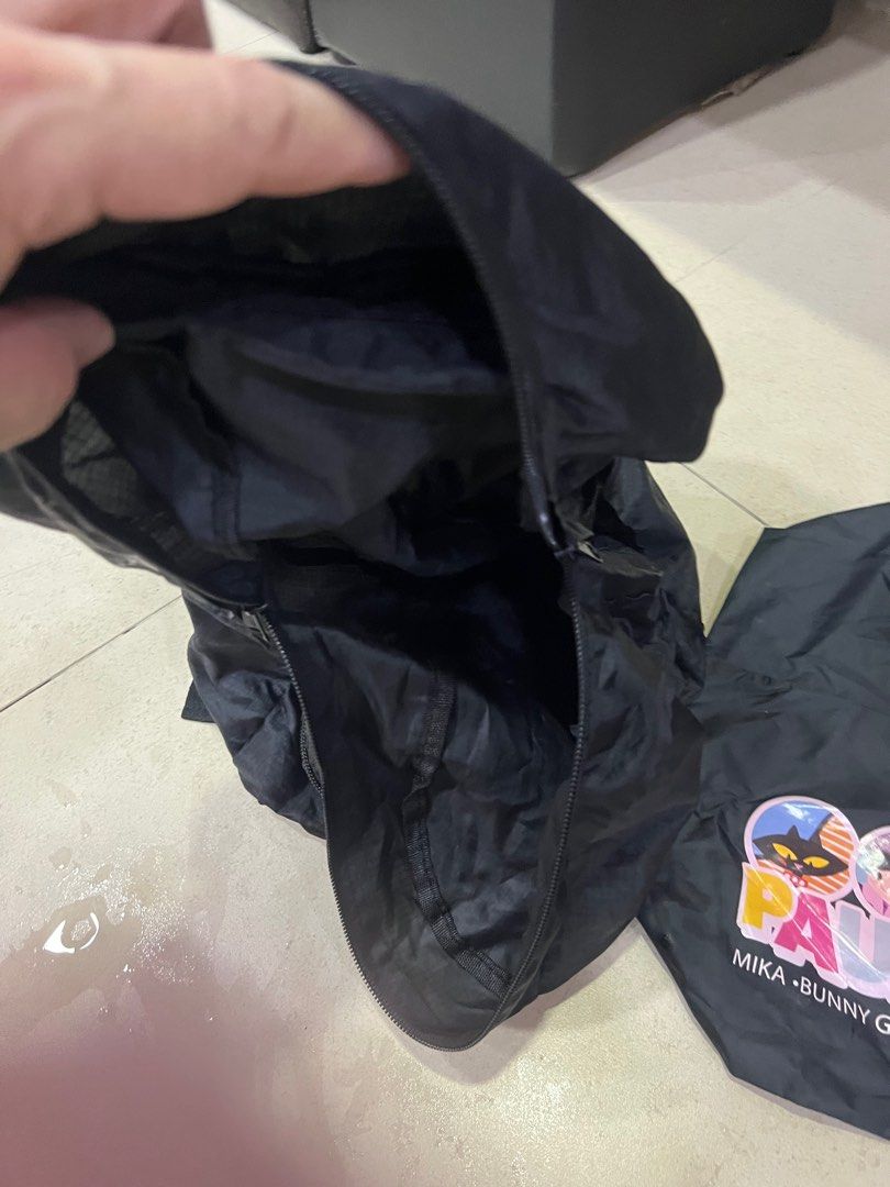Onepoint Foldable Backpack - Black (Category: Backpacks) located in Singapore. Submitted by danlim88 (Listing ID 1388726708, Image 2). Description: - Lightweight and foldable design - Perfect for travel or everyday use - Main compartment for storage - Front pocket for easy organization - In good condition.