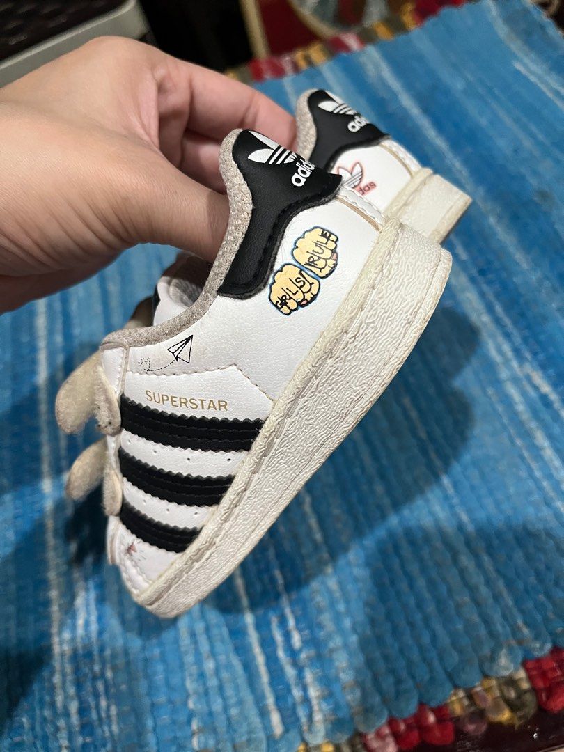 Original Adidas Superstar for toddler (Category: Babies & Kids Fashion) located in Antipolo. Submitted by impulsivegurl (Listing ID 1388757820, Image 3). Description: Fave pair!!! US 6k, UK 6 1/2 - can fit til 13.5cm Used from 1-2 yo Has very cute designs No issues or flaws No more box rfs: doesn’t fit anymore.