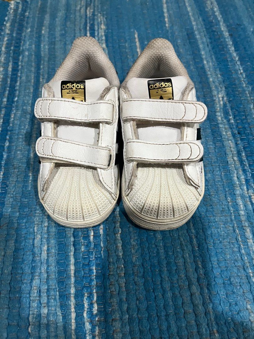 Original Adidas Superstar for toddler (Category: Babies & Kids Fashion) located in Antipolo. Submitted by impulsivegurl (Listing ID 1388757820, Image 2). Description: Fave pair!!! US 6k, UK 6 1/2 - can fit til 13.5cm Used from 1-2 yo Has very cute designs No issues or flaws No more box rfs: doesn’t fit anymore.