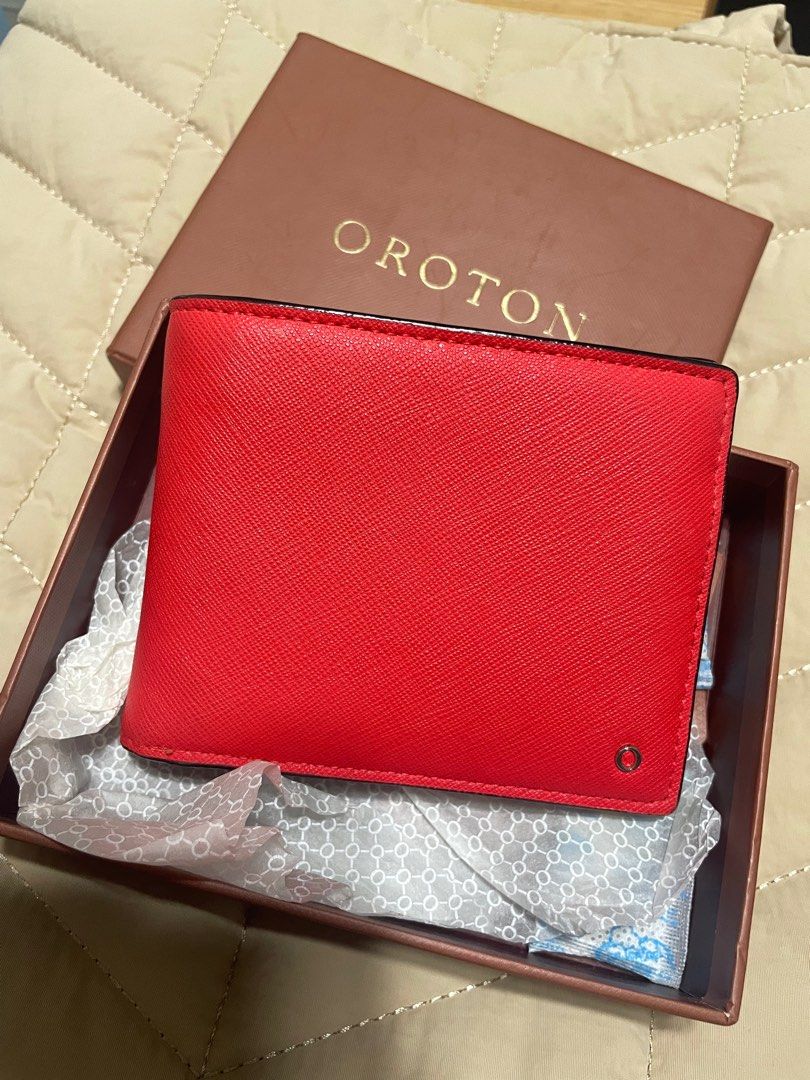 Oroton wallet (Category: Luxury Bags & Wallets) located in Las Pinas. Submitted by kay.hsa (Listing ID 1388875537, Image 1). Description: Oroton wallet Color: red outer / yellow inner Comes with box. Never been used but with slight flaw as shown in photos. Loc: Las Pinas Sf c/o buyer.