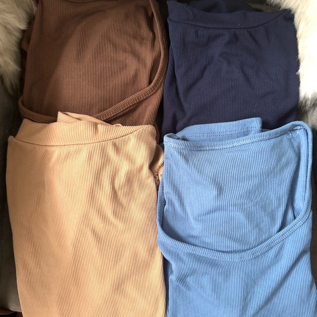 4pcs Ribbed top plus size take all (Category: Blouses) located in Cainta. Submitted by kei_21 (Listing ID 1388796024, Image 2). Description: Closet cleanup sale Decluttering Take all 4pcs For size large to xl Super stretchable ribbed fabric Can fit up to 44bust / 36waist Beige tan - unused Choco brown - used once Navy blue - unused Blue - once used I bought it in live selling for 180 each Selling low Loc: Pasig.