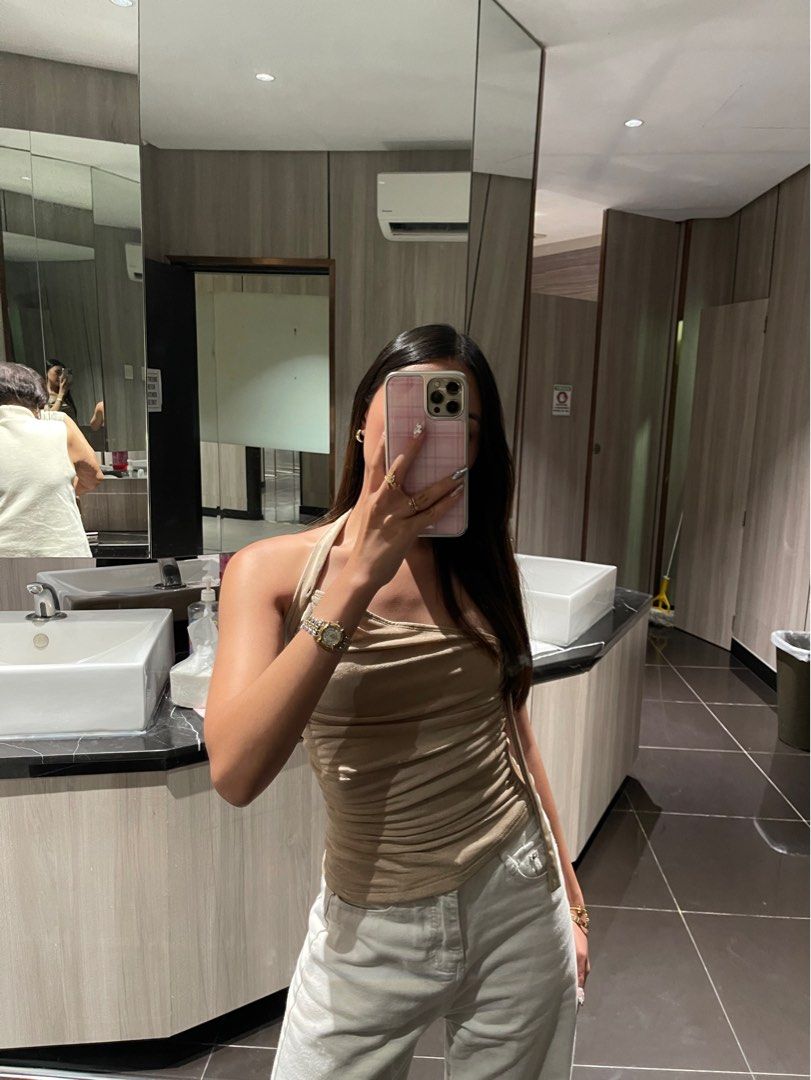 Ruched asymmetrical top (Category: Sleeveless) located in Manila. Submitted by dendm (Listing ID 1388737225, Image 2). Description: used once only (rfs: buckle too lose for my bust) - first pic shein, second when worn - landmark: abad santos lrt station - MOD: gcash - MOP: lalamove.