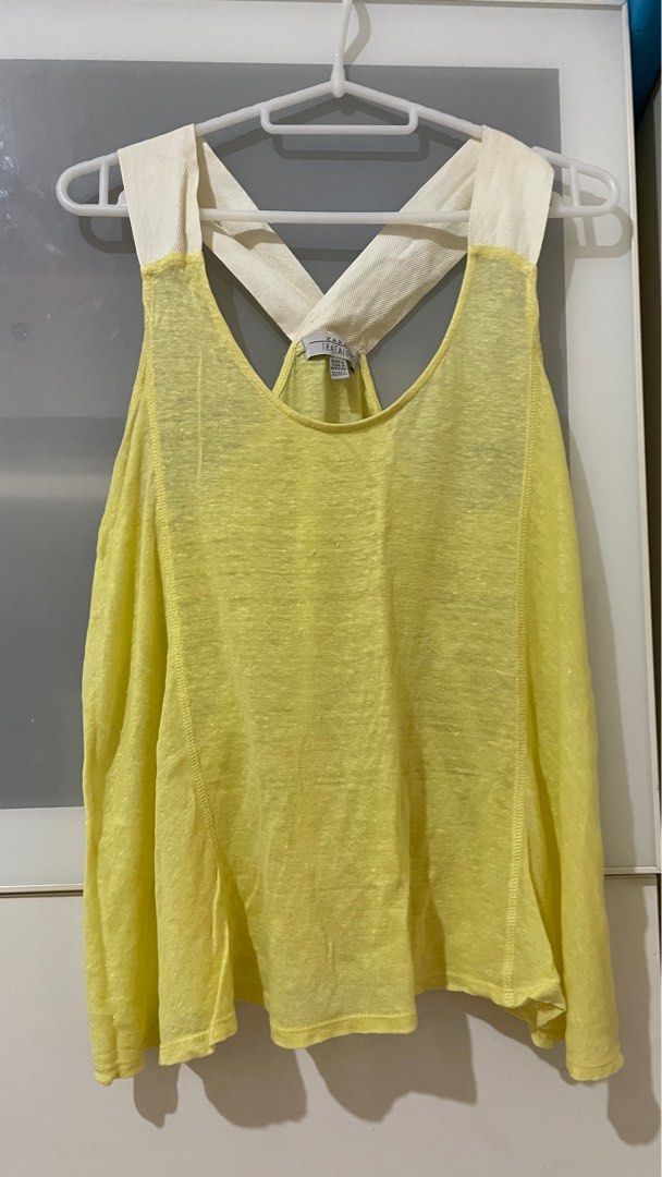 Zara A-line blouse (Category: Blouses) located in Taguig. Submitted by lam_decluttering (Listing ID 1388767853, Image 1). Description: Loose Linen Tank top Zara Trafaluc top color: yellow.