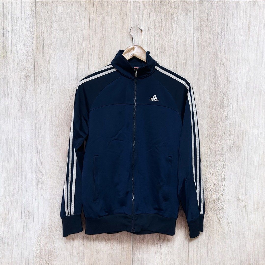 ADIDAS Essentials Warm Up 3 Stripes Track Jacket NAVY (Category: Coats, Jackets and Outerwear) located in Mandaluyong City. Submitted by leajiwon (Listing ID 1388953799, Image 1). Description: ADIDAS Essentials Warm Up 3 Stripes Mens Track Jacket - Navy Available size 20.5 x 28 20 x 26.5.