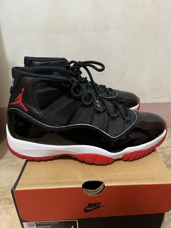 Air Jordan 11 Retro Bred (Category: Sneakers) located in Manila. Submitted by thriftnikeenan (Listing ID 1389058809, Image 2). Description: Air Jordan 11 Retro Bred Size 9.5 Used only once Bought in Stock X Singapore Stock x verified complete everything with box and card.