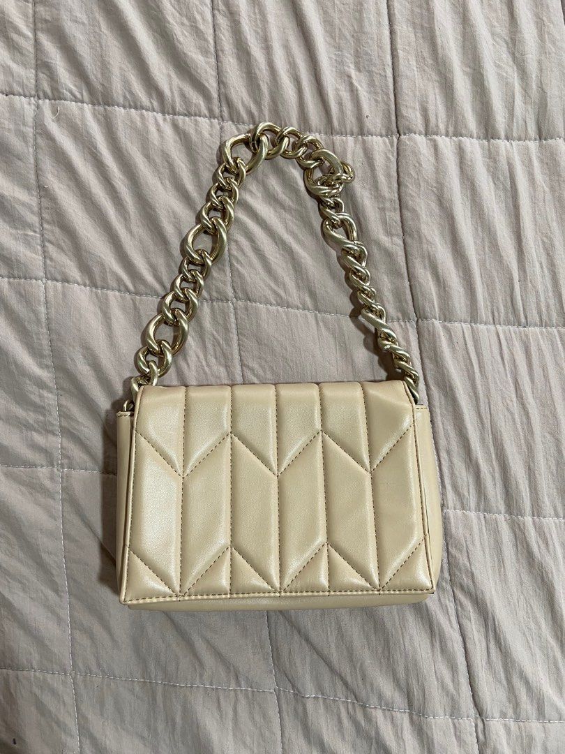 Call it spring Beige / Nude Textured PU Structured Quilted Sling Bag (Category: Cross-body Bags) located in Cavite. Submitted by pseudofairy (Listing ID 1389025123, Image 1). Description: .
