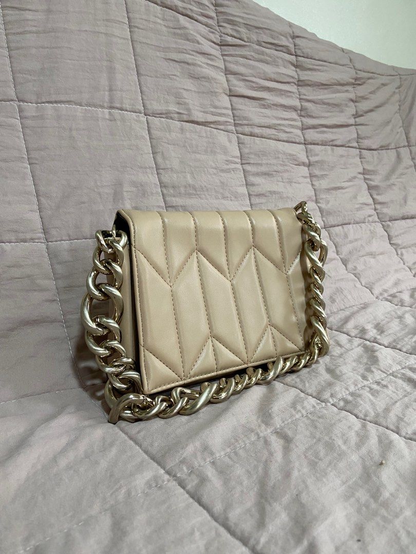 Call it spring Beige / Nude Textured PU Structured Quilted Sling Bag (Category: Cross-body Bags) located in Cavite. Submitted by pseudofairy (Listing ID 1389025123, Image 3). Description: .