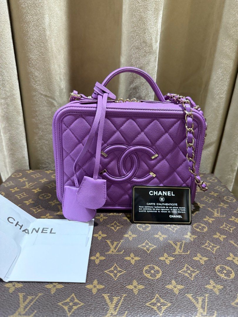 Chanel Filigree Vanity Case Medium in Purple (Category: Luxury Bags & Wallets) located in Quezon City. Submitted by theluxegallery (Listing ID 1388951392, Image 1). Description: Light gold hardware 28 series with official receipt Comes with dust bag and box.