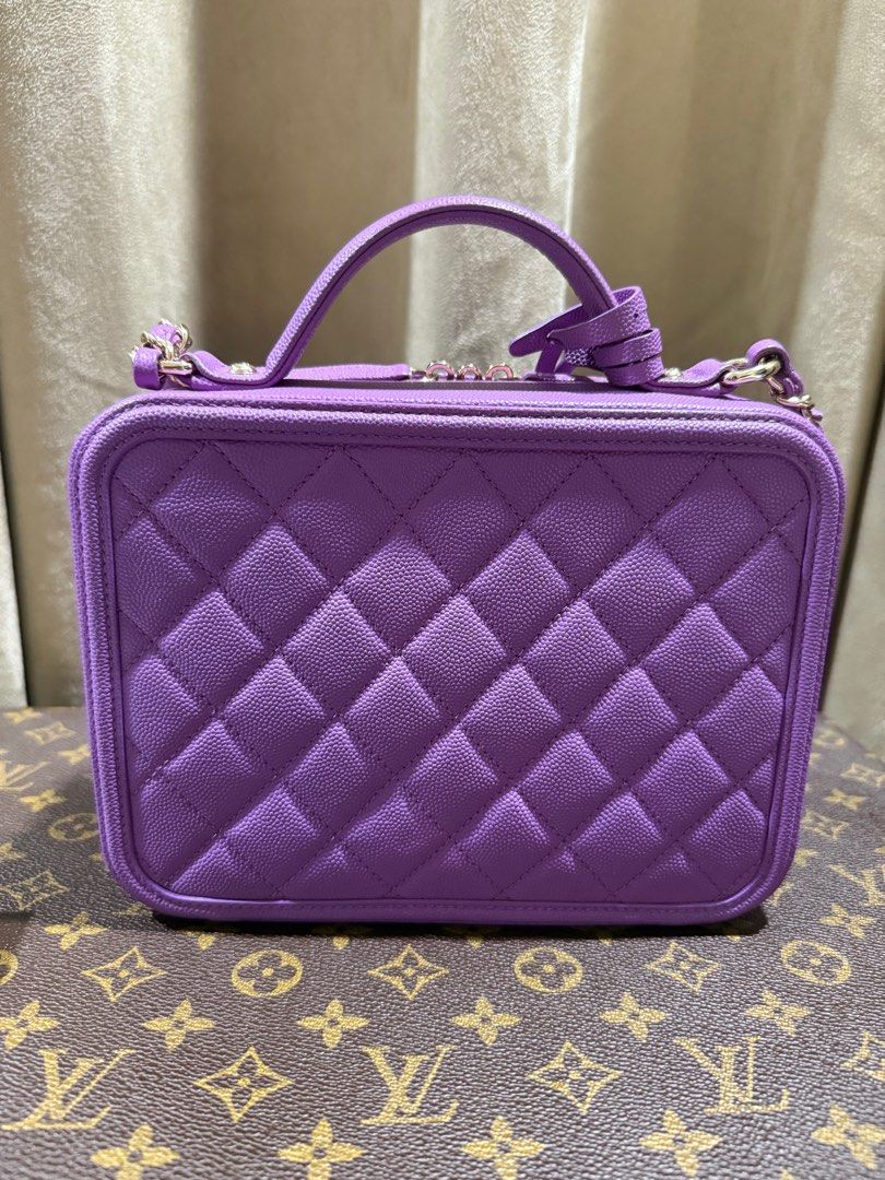 Chanel Filigree Vanity Case Medium in Purple (Category: Luxury Bags & Wallets) located in Quezon City. Submitted by theluxegallery (Listing ID 1388951392, Image 3). Description: Light gold hardware 28 series with official receipt Comes with dust bag and box.