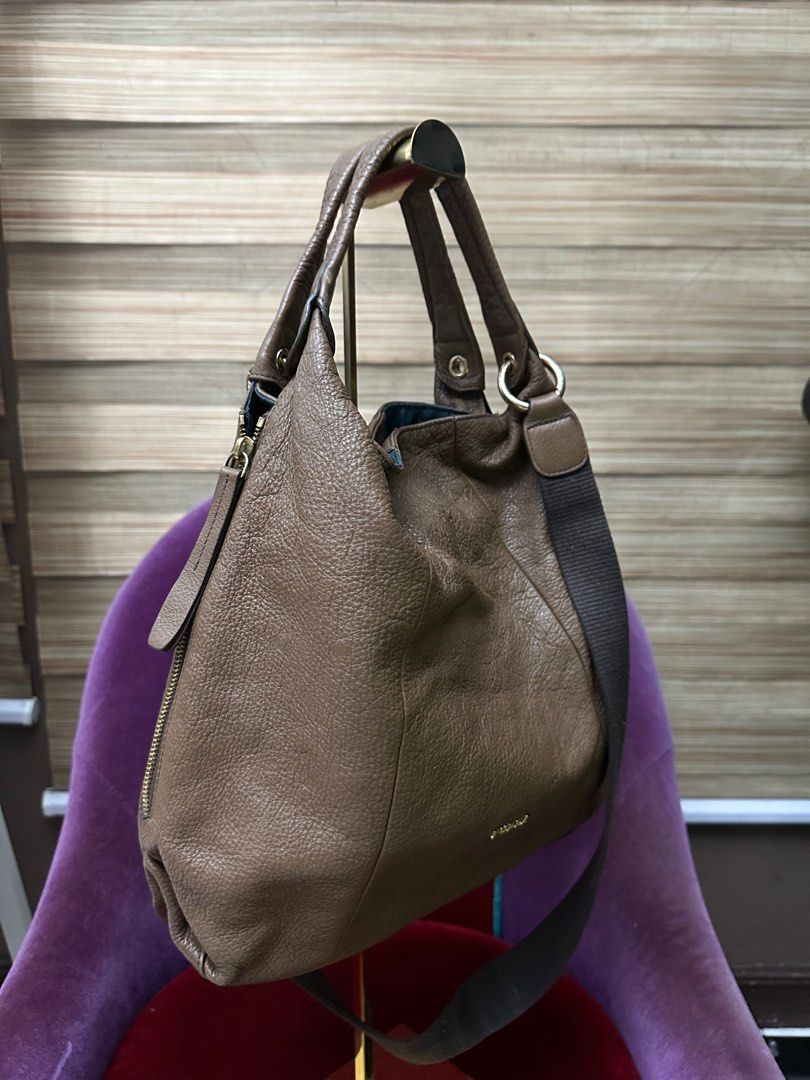 Furla Hobo Bag (Category: Tote Bags) located in Pasig City. Submitted by fashionalternatives (Listing ID 1389049267, Image 2). Description: Preloved Furla Two Way Bag Hobo with strap Grained leather with sign of use since its preloved .