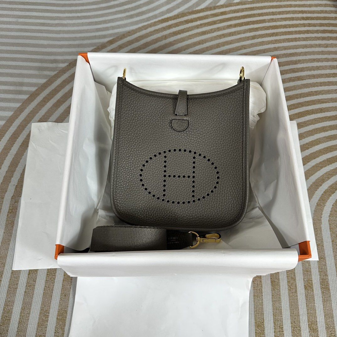 Hermes Evelyn Mini 16cm Grey Togo (Category: Luxury Bags & Wallets) located in Pasig City. Submitted by wmsbags_2 (Listing ID 1388953610, Image 1). Description: Available ❗️ VIP HANDMADE ✅Perfect workmanship ✅Fully hand stitched ✅Fine stamp & Code ✅100% Hardware materials structured ✅Real Leather ✅We do deliver (any) ✅ or meet up ( metro manila area) ✅We shipp all nationwide ✅Complete Inclusion MODE OF PAYMENT 📌CREDIT CARD & Cash accepted 📌Gcas