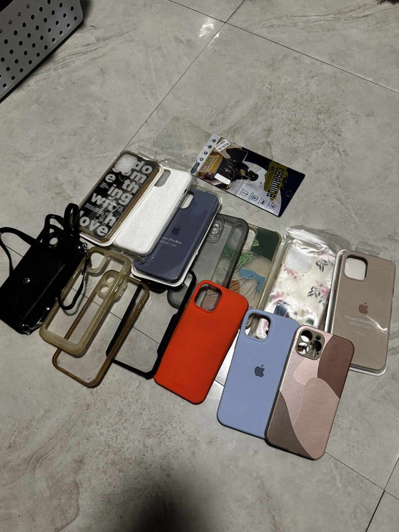 Iphone 12 Pro Max TAKE ALL CASES SCREEN PROTECTOR (Category: Cases & Sleeves) located in Caloocan City. Submitted by ongjamelah (Listing ID 1389064547, Image 1). Description: selling all for 300 pesos. negotiable. - most of it are used but not abused naman. - 14 phone cases - 2 tempered glass (1 with black edges and isa na wala).