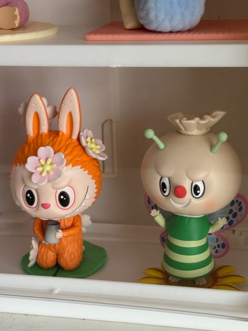 Labubu figurines (Category: Designer & Blind Box Toys) located in Las Pinas. Submitted by olivem (Listing ID 1389039772, Image 2). Description: Buy set for 1k!! 350 each. Complete with box and card.