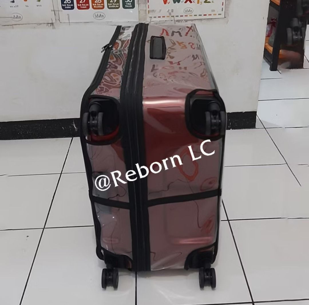 LOJEL Medium Transparent Luggage Cover (Category: Luggage) located in Manila. Submitted by hellostreetmarket_ (Listing ID 1389054695, Image 3). Description: LOJEL Medium Transparent Luggage Cover. ON-HAND. Customized specifically for Lojel. First 4 photos are references. The actual item has dark gray lining. It has the front zipper opening, and middle zipper for the expansion. RFS: I bought the large luggage instead of medium so I am unable to us