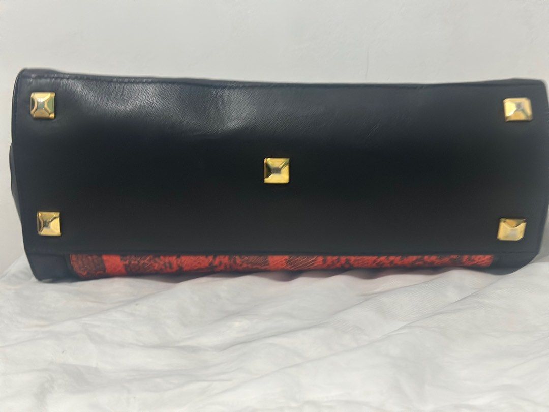 MCM Milla Tote Bag (Category: Luxury Bags & Wallets) located in Quezon City. Submitted by donaya_luxe (Listing ID 1388974737, Image 3). Description: No flaws and please see pics for reference. Approximately 15'x12"x5' Dimensions Spacious enough that can fit your tablet , umbrella etc .
