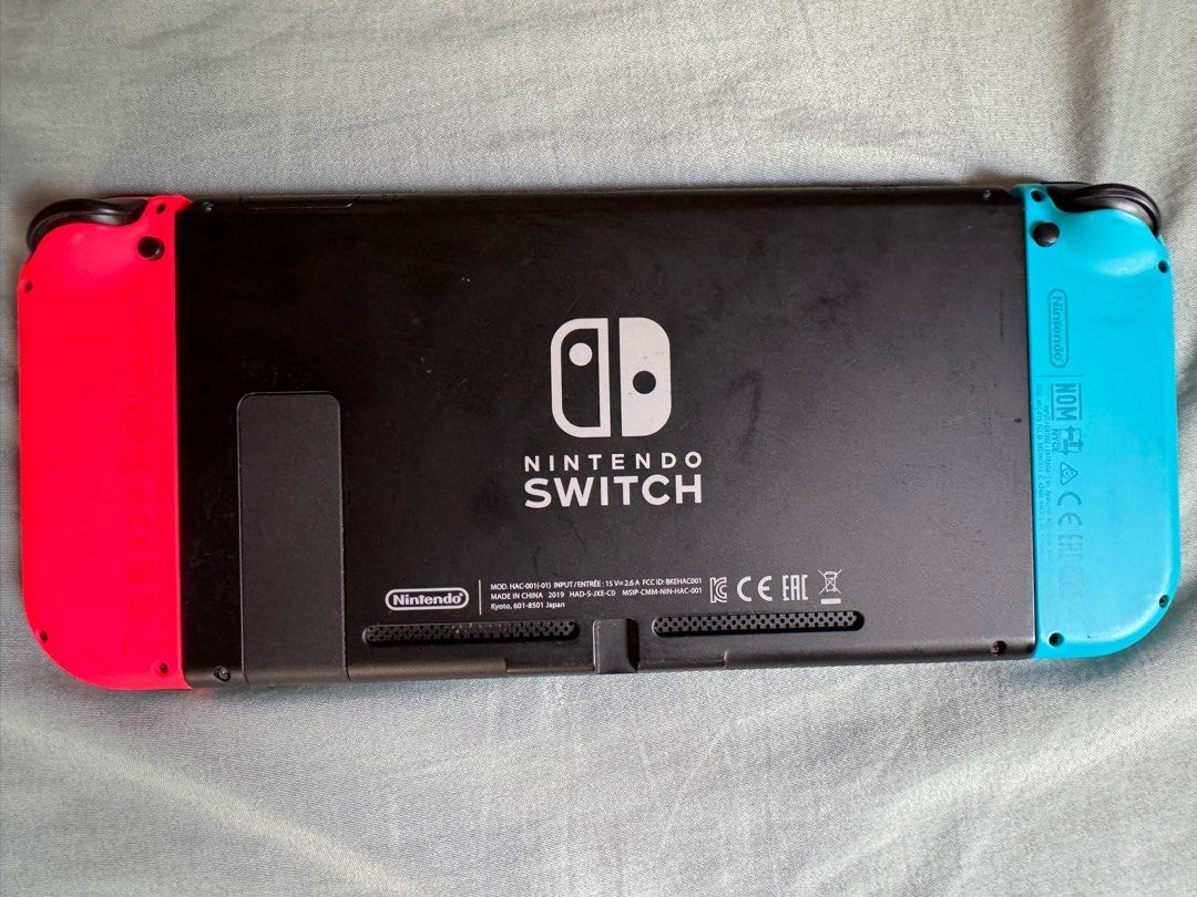 Nintendo Switch V2 (Neon) (Category: Other Mobile & Gadget Accessories) located in Caloocan City. Submitted by nthlzam (Listing ID 1388923635, Image 3). Description: RFS(Reason For Selling): Might upgrade to switch 2 or oled -preloved, no cracks (w box) -Accessories (Complete): Nintendo Switch Dock (with LAN port) Joy Con (L) White Joy Con (R) White Joy Con Straps Joy Con Grip HDMI® Cable Nintendo Switch AC Adapter (I have some freebies to add) F