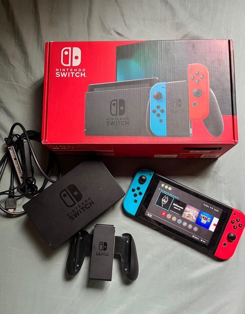 Nintendo Switch V2 (Neon) (Category: Other Mobile & Gadget Accessories) located in Caloocan City. Submitted by nthlzam (Listing ID 1388923635, Image 1). Description: RFS(Reason For Selling): Might upgrade to switch 2 or oled -preloved, no cracks (w box) -Accessories (Complete): Nintendo Switch Dock (with LAN port) Joy Con (L) White Joy Con (R) White Joy Con Straps Joy Con Grip HDMI® Cable Nintendo Switch AC Adapter (I have some freebies to add) F