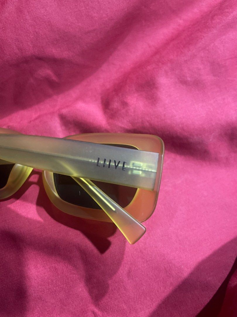 Rectangular Sunglasses (Category: Sunglasses & Eyewear) located in Singapore. Submitted by sdklv (Listing ID 1389072807, Image 2). Description: -LIVV brand sunglasses from Bali -Bought in Ripcurl for 600,000 IDR = 47 SGD - Rectangular frame - YELLOW frame - Dark lenses - Suitable for everyday wear -Trending shape -Brand new without tag.
