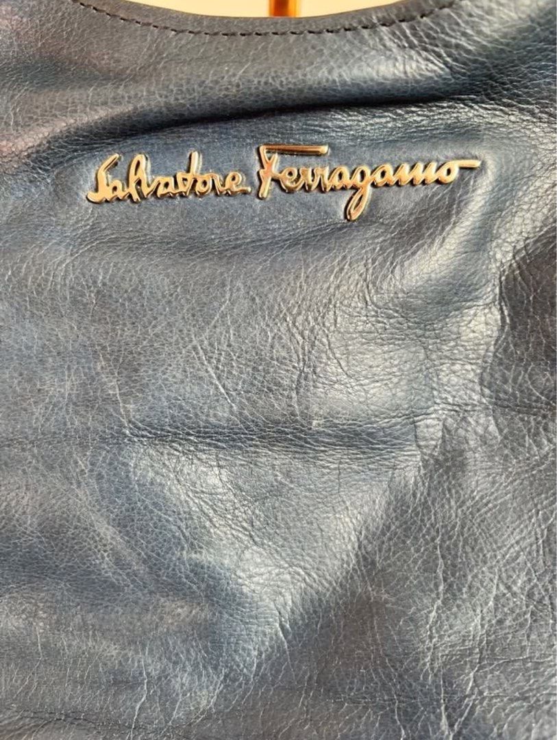 Salvatore Ferragamo Leather Hobo bag (Category: Luxury Bags & Wallets) located in Muntinlupa City. Submitted by secondemain.ph (Listing ID 1389040771, Image 2). Description: •Color: Blue •100% Leather (Made in Italy) • Snap closure •Silver hardware •15” L x 3.75” W x 10” H. 9.5” Strap drop •Inclusions: 9.8/10 BRAND NEW but stored for a few years. With a little musty smell but can be easily removed. Comes with original salvatore ferragamo dust bag