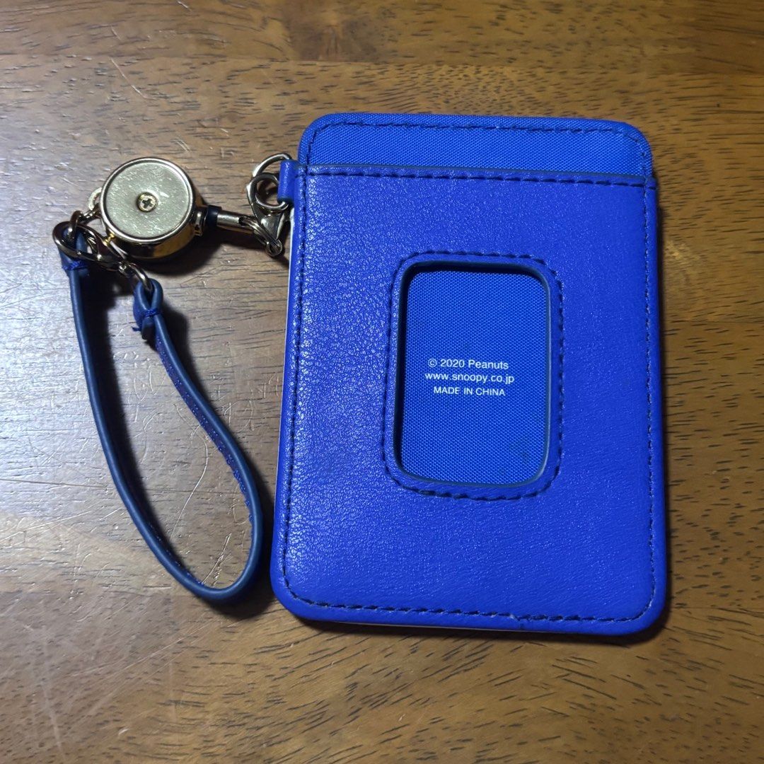 Snoopy and siblings pass case with retractable sling/ reel (Category: Wallets & Card holders) located in Calamba. Submitted by cur8d (Listing ID 1389021426, Image 3). Description: .