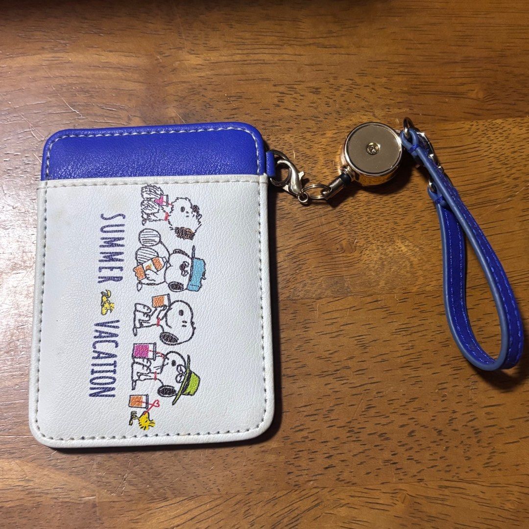 Snoopy and siblings pass case with retractable sling/ reel (Category: Wallets & Card holders) located in Calamba. Submitted by cur8d (Listing ID 1389021426, Image 1). Description: .