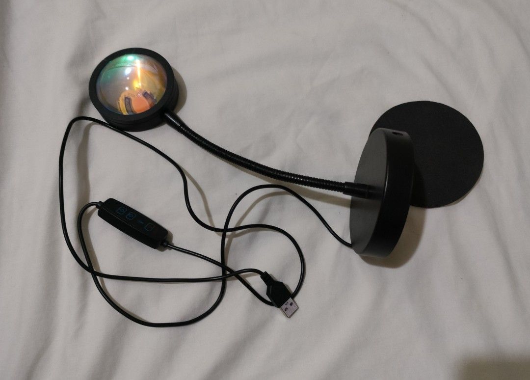 Sunset Light Projector (Category: Other Home Decor) located in Bulacan. Submitted by decluttermeans (Listing ID 1388985964, Image 2). Description: Sunset Light Projector Sunset 5w Dimmable Rfs: Decluttering LOC: San Jose Del Monte, Bulacan MOP: Gcash/PayMava MOD: J&T (delivery fee is shouldered by buyer) Can do meetup (Starmall & SM tungko) PM me for inquiries.