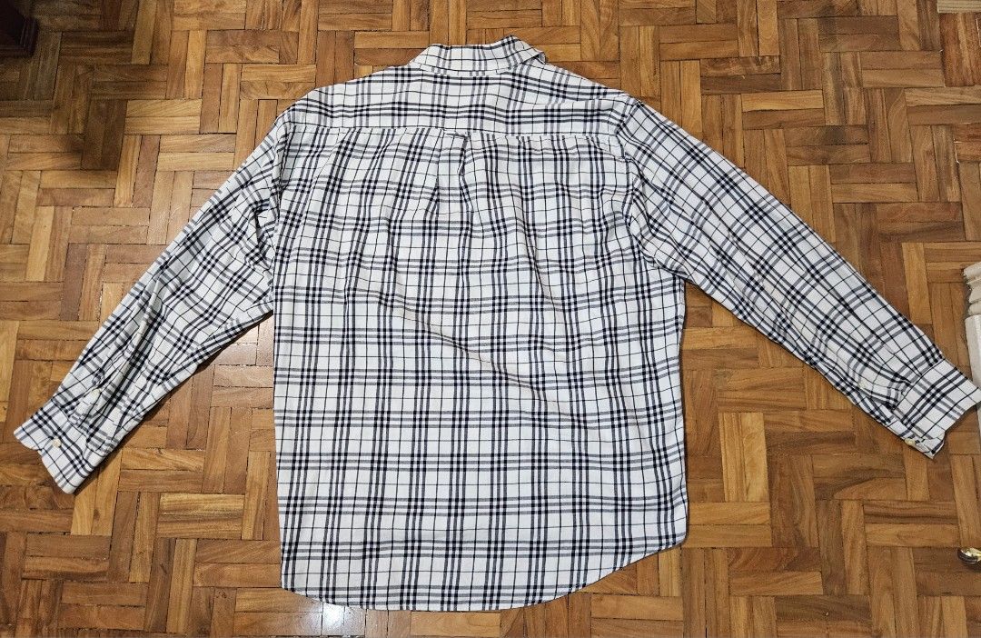 Vintage Plaid Burberry Longsleeves (Category: Formal Shirts) located in Mandaue City. Submitted by robertnpompompurin (Listing ID 1388928169, Image 2). Description: Length: 26 1/2 Width: 24 1/2 Shoulder to Shoulder: 20 inches Issues: Orange colour stain on the inner collar. Will try to clean it if possible. Will send pictures to anyone who needs clarification Note: Lucky thrifted find that was given to me by my father. Selling it due to unuse..