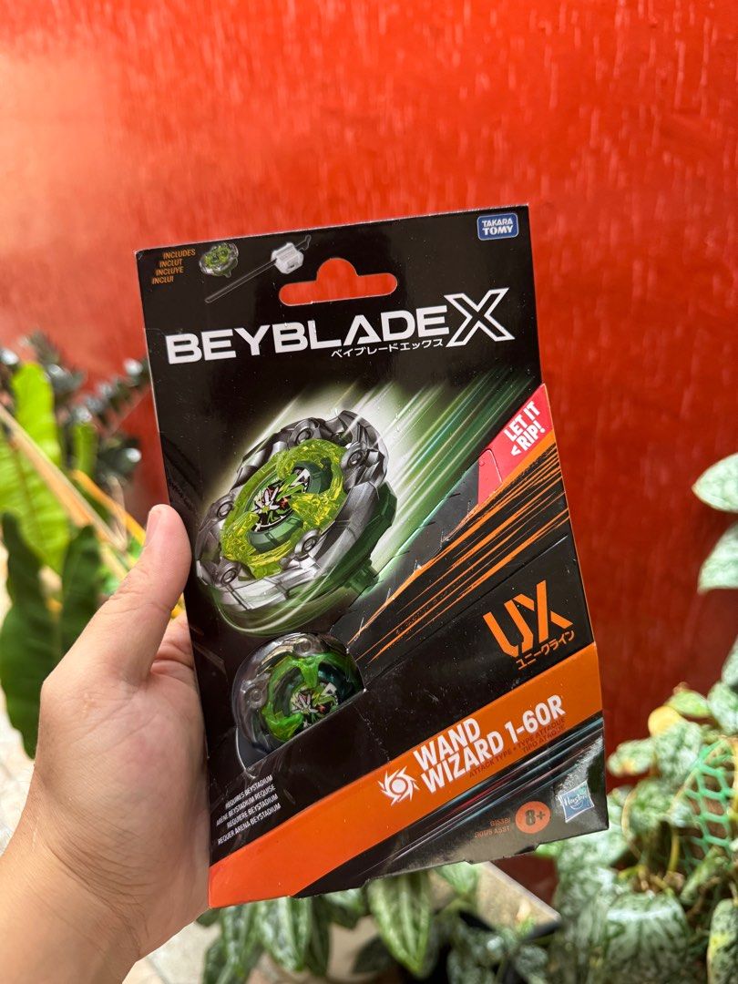 Beyblade X Hasbro Wand Wizard 1-60R (Category: Action & Battle Toys) located in Cavite. Submitted by hyggeee (Listing ID 1389144888, Image 1). Description: Available on hand ✨ Sealed | Unused code Ban kee👇 BX 11 Hand Grip - 400 BX 15 Leon Claw - 1000 CX 01 DranBrave - 1000 CX 03 Perseus Dark - 750 UX 05 Random Booster - 750 UX 08 Silver Wolf - 1000 UX 13 Golem Rock - 800 CX 07 Pegasus Blast - 1250 Non ban kee👇 UX 00 Aero Pegasus (JP) - 12500 UX