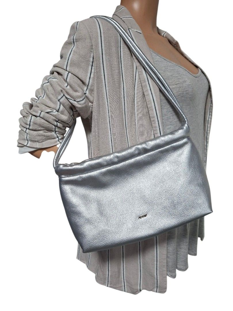 Brandnew Aztrid Silver (3way) (Category: Shoulder Bags) located in Rizal. Submitted by KCS0001 (Listing ID 1389225405, Image 2). Description: Never Used Medium Size 3way bag - Clutch, Shoulder, Sling 1000 down to 800 (LP).