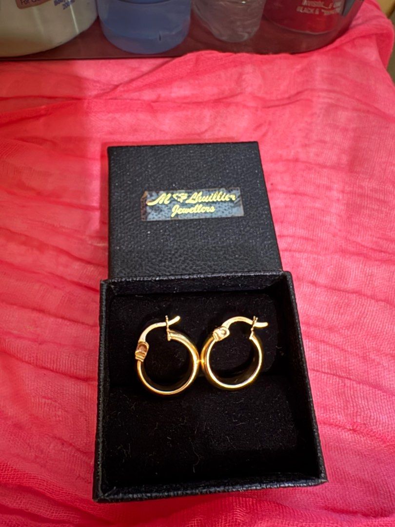 Hoop Earrings 18K Pawnable Gold (Category: Earrings) located in Cagayan de Oro. Submitted by authenticstuffsdecluttering (Listing ID 1389188878, Image 1). Description: This is solid. Not hollow. This is premium madeearring. Weight: 1.90 grams *updated as of march 4, 2026.