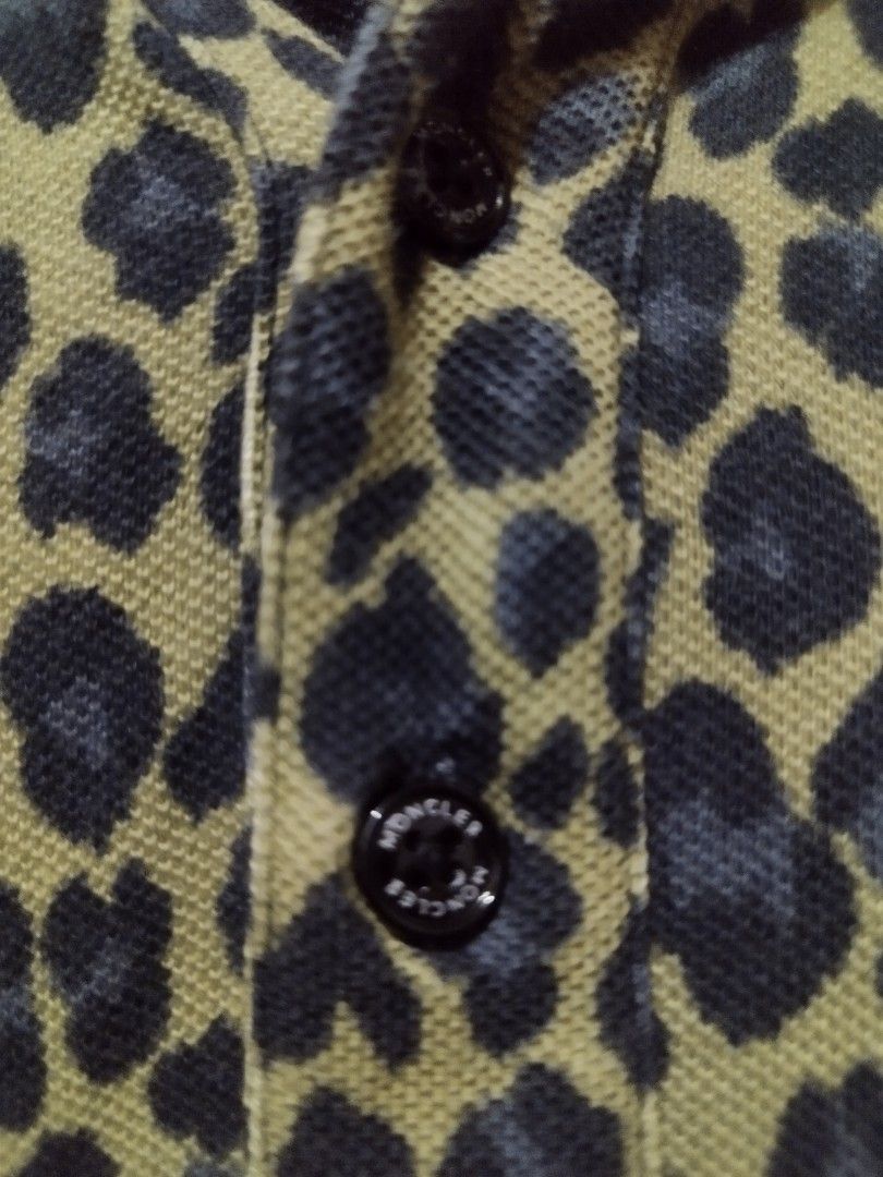 Moncler Polo Shirt (Rare) (Category: Tshirts & Polo Shirts ) located in Manila. Submitted by beanieracha (Listing ID 1389274373, Image 3). Description: Moncler Polo Shirt (Rare) Jaguar Design Size Small on Tag 2k Negotiable Paco Manila, loc.