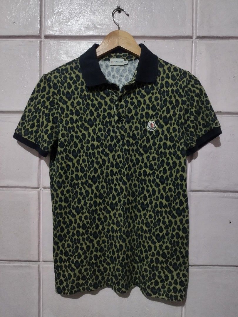 Moncler Polo Shirt (Rare) (Category: Tshirts & Polo Shirts ) located in Manila. Submitted by beanieracha (Listing ID 1389274373, Image 1). Description: Moncler Polo Shirt (Rare) Jaguar Design Size Small on Tag 2k Negotiable Paco Manila, loc.