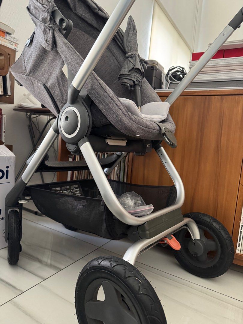 Stokke scoot stroller (Category: Strollers) located in San Juan City. Submitted by pritiawesome (Listing ID 1389141534, Image 2). Description: Lightly used Stokke stroller, but with minimal wear in some fabric portions. Wheels and all other mechanisms working perfectly. Still in great condition. Included are attachments like umbrella and canopy. .