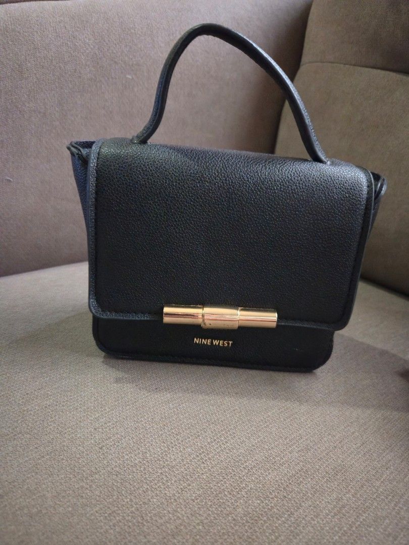 Used Nine west sling (Category: Cross-body Bags) located in Cainta. Submitted by nessft (Listing ID 1389296699, Image 1). Description: orig. used. see pix for flaws..