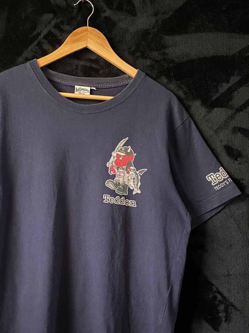 Vintage Ted Company Shirt (Category: Tshirts & Polo Shirts ) located in San Juan City. Submitted by collective__ (Listing ID 1389182897, Image 3). Description: Vintage Ted Company Shirt * Dimension - L 26.5 x W 21 inches * Sleeve Length - 8.5 inches * Shoulder - 5.5 inches * Hem - 21 inches * Size Label - 40 * Color Rate - 9/10 * Condition - 9/10 * Tedman * Lucky Red Devil - The color may vary due to lightning - Sleeve details - Excellent conditi