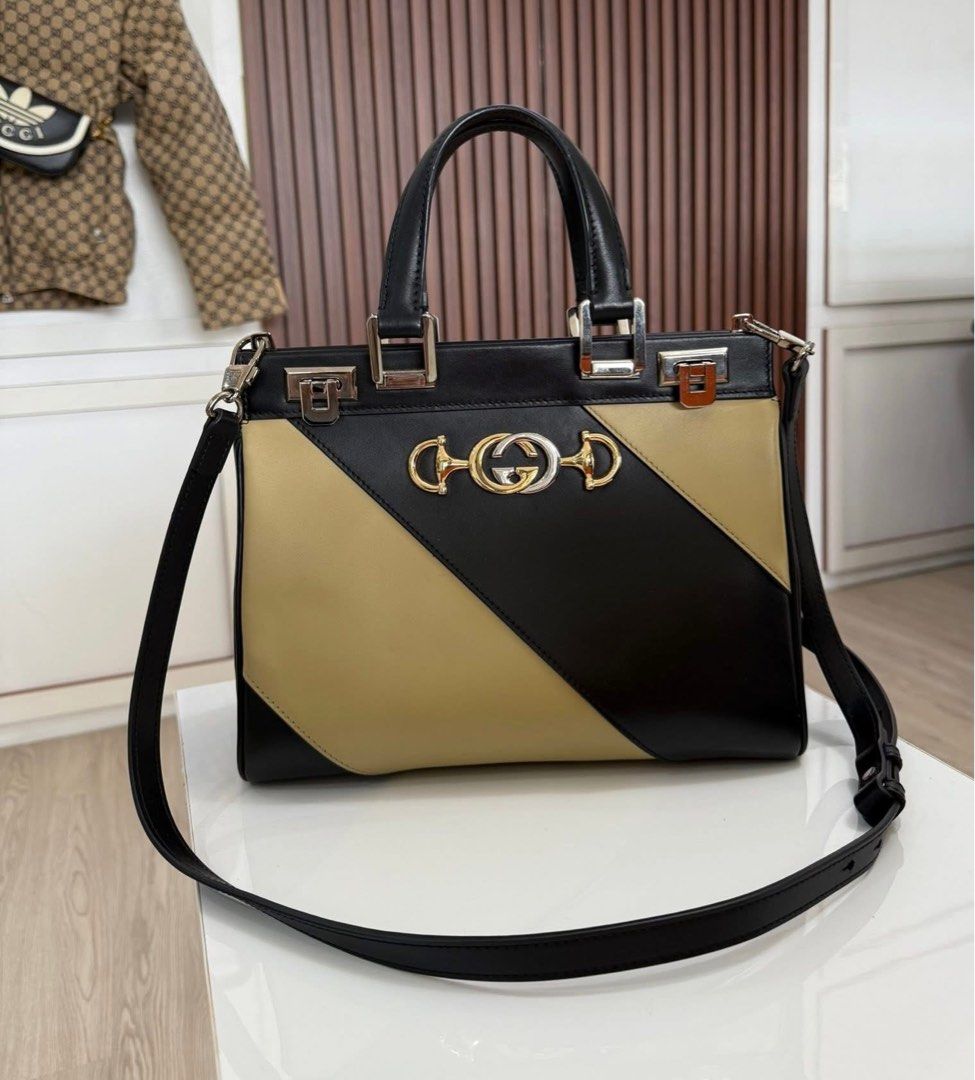 authentic Gucci Zumi Two Tone Small Top Handle (Category: Luxury Bags & Wallets) located in Quezon City. Submitted by jhaediah (Listing ID 1389428874, Image 1). Description: Zumi Two Tone Small Top Handle ✨Rank A Condition.