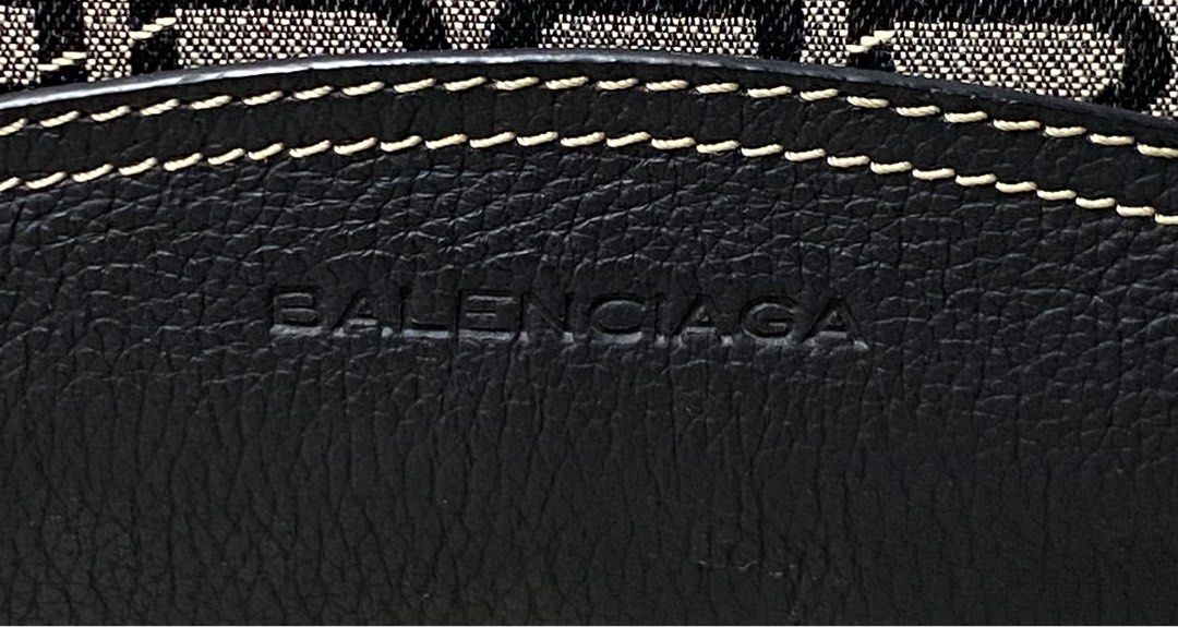 Balenciaga - Vintage BB Monogram Canvas Handle Bag (Category: Luxury Bags & Wallets) located in Quezon City. Submitted by insidethreads_ (Listing ID 1389479134, Image 2). Description: Condition: 9/10 Flaw: Minor flaw on corners dm for more detailed photos. Era: Vintage No inclusion Made in: Italy Material: Leather/Canvas Dimensions Width: 16.5” Height: 9” Depth: 4” Strap drop: 7”.