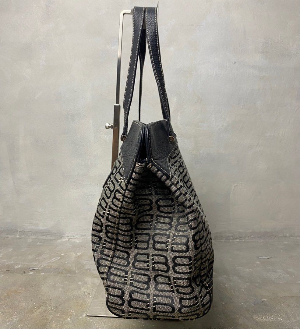 Balenciaga - Vintage BB Monogram Canvas Handle Bag (Category: Luxury Bags & Wallets) located in Quezon City. Submitted by insidethreads_ (Listing ID 1389479134, Image 3). Description: Condition: 9/10 Flaw: Minor flaw on corners dm for more detailed photos. Era: Vintage No inclusion Made in: Italy Material: Leather/Canvas Dimensions Width: 16.5” Height: 9” Depth: 4” Strap drop: 7”.