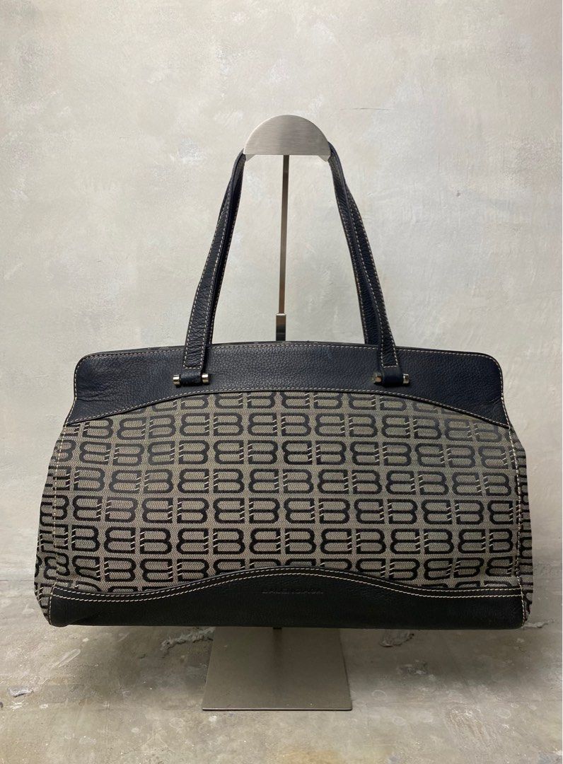 Balenciaga - Vintage BB Monogram Canvas Handle Bag (Category: Luxury Bags & Wallets) located in Quezon City. Submitted by insidethreads_ (Listing ID 1389479134, Image 1). Description: Condition: 9/10 Flaw: Minor flaw on corners dm for more detailed photos. Era: Vintage No inclusion Made in: Italy Material: Leather/Canvas Dimensions Width: 16.5” Height: 9” Depth: 4” Strap drop: 7”.