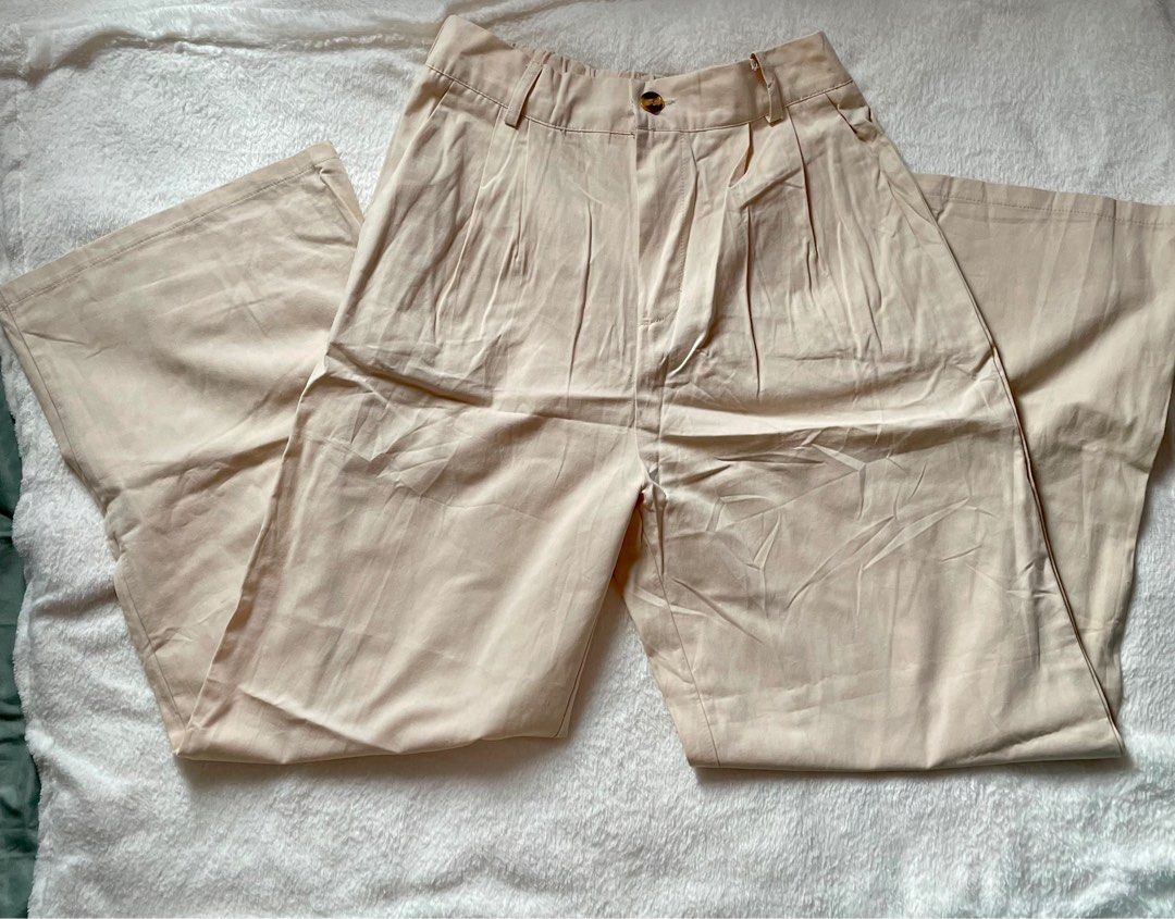 BKK Cream Wideleg Trouser (Category: Other Bottoms) located in Quezon City. Submitted by vmariacos (Listing ID 1389354286, Image 1). Description: Brand new! Never worn. Just an impulse buy. Garterized waist as the back. 38inches length Waist, when laid flat and stretched, is around 15inches.