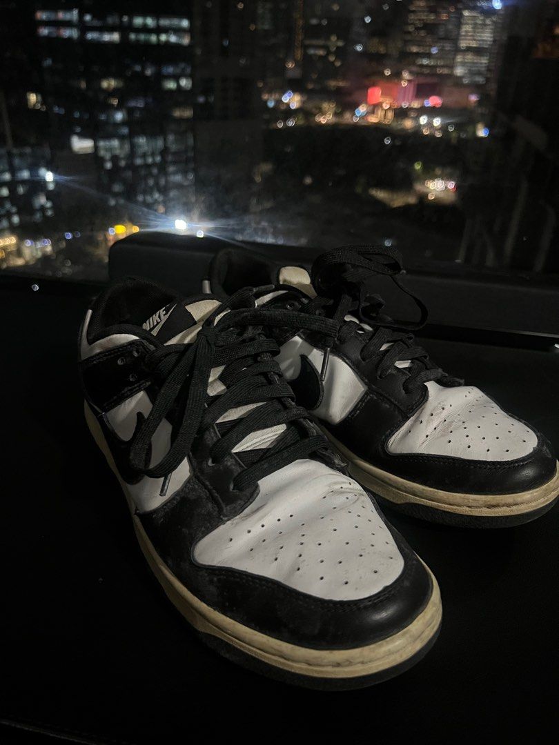 Dunks Panda (Category: Sneakers) located in Manila. Submitted by angelobggnn (Listing ID 1389433921, Image 1). Description: Well used Dunks. No box. Pair only. Pick up at BGC..