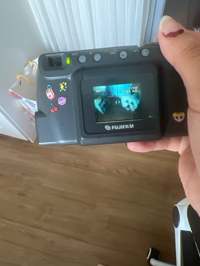 Fujifilm finepix1400 Zoom (Category: Cameras) located in Pasig City. Submitted by sofiescloset_ (Listing ID 1389312779, Image 3). Description: • BUY AT YOUR OWN RISK‼️ (bought the camera second hand so please manage your expectations) • takes film-like photos • uses smartmedia card and rechargeable batteries (not included) • honest issues: camera turns on and functions properly (zoom, timer, flash, etc.) are working but pictures don’t save and ca
