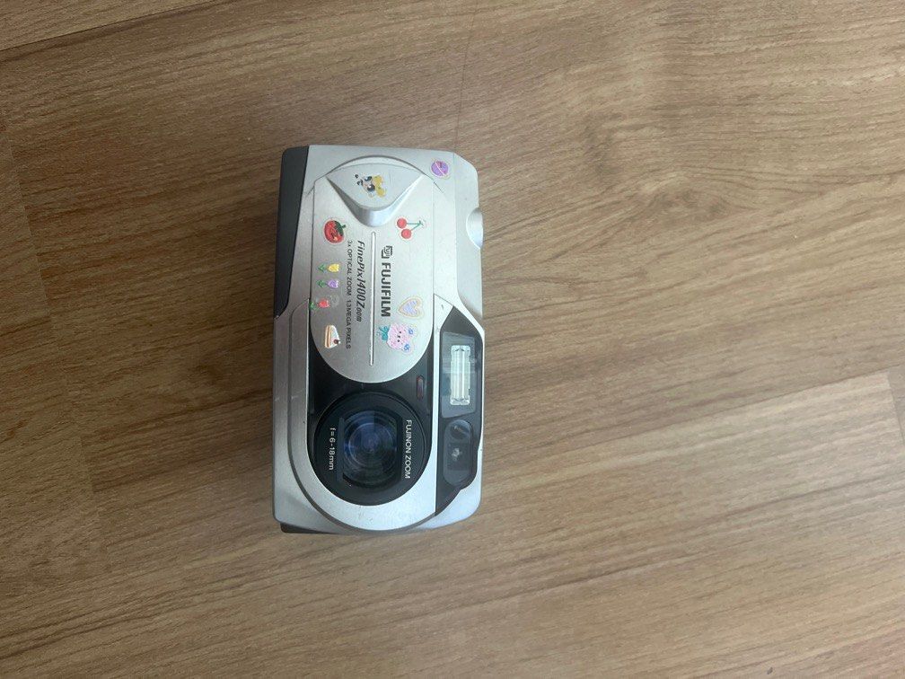 Fujifilm finepix1400 Zoom (Category: Cameras) located in Pasig City. Submitted by sofiescloset_ (Listing ID 1389312779, Image 2). Description: • BUY AT YOUR OWN RISK‼️ (bought the camera second hand so please manage your expectations) • takes film-like photos • uses smartmedia card and rechargeable batteries (not included) • honest issues: camera turns on and functions properly (zoom, timer, flash, etc.) are working but pictures don’t save and ca