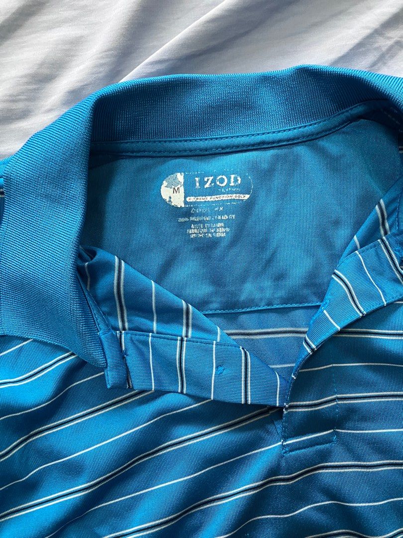 Izod blue golf polo shirt (Category: Tshirts & Polo Shirts ) located in Quezon City. Submitted by teesnpolos (Listing ID 1389399629, Image 3). Description: See pictures for condition and measurements Location: qc MOD: arranged by buyer/ can be coordinated in chat MOP: bank transfer/gcash.