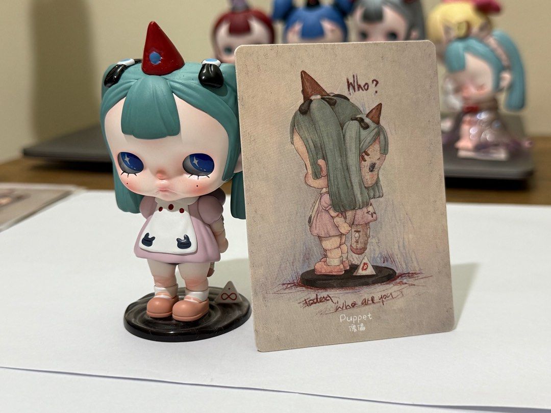 POPMART TinyTiny (Puppet) (Category: Designer & Blind Box Toys) located in Quezon City. Submitted by cluttercures (Listing ID 1389471936, Image 1). Description: Authenic POPMART TinyTiny (Puppet) Note: Does not come in a box or wrapper anymore but it comes with its photo card Bought from POPMART MOA Rfs: No longer collecting Loc: Quezon City Lalamove ready .