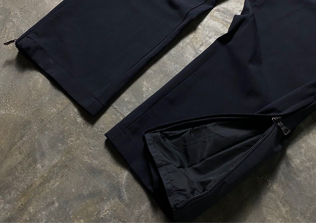 Prada SS99 Technical Trouser (Category: Trousers) located in Quezon City. Submitted by insidethreads_ (Listing ID 1389480264, Image 3). Description: Size: 30-31 Waist Condition: 10/10 Material: 100% Polyester Made in: Italy Dimensions Length: 41” Inseam: 32” Thigh: 12” Knee: 9.5” Leg opening: 7.5” Front rise: 10.5” .