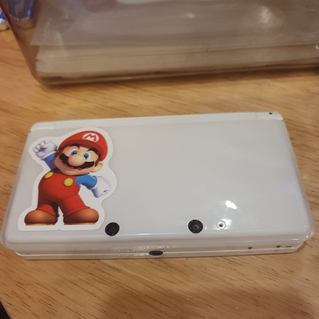 Selling White Nintendo 3ds (Category: Nintendo) located in Quezon City. Submitted by itemsforadoption (Listing ID 1389440278, Image 1). Description: Rfs: Its 2025! Happy New Year! Hoping you have a good year ahead of you! If you have questions feel free to send a message. Though I'll most likely be able to reply from 10am to 8pm. Please be patient and understanding. Decluttering games and items that I've picked up or for friends and family. 4000 
