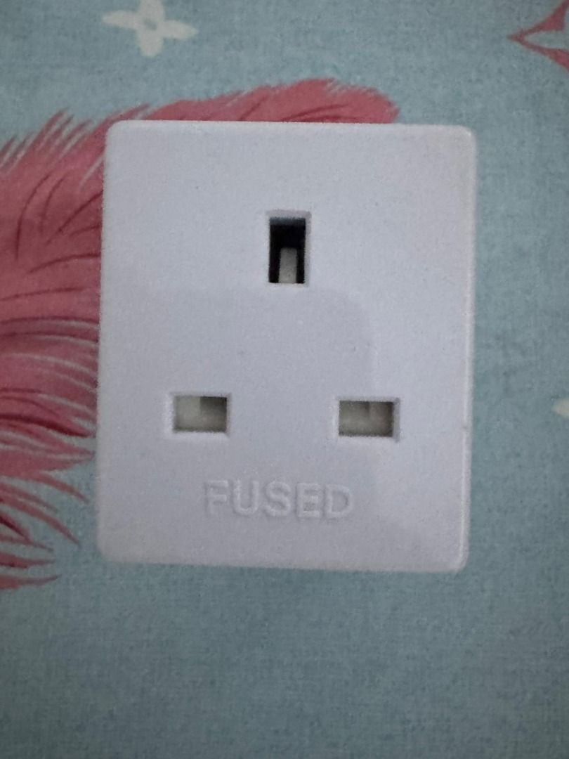 Universal Plug Adapter (Category: Electrical, Adaptors & Sockets) located in Singapore. Submitted by lenin_sg (Listing ID 1389333311, Image 2). Description: - Universal plug adapter - Compatible with various plug types - Easy to use with 2-pin plugs - Fused design for safety - In good working condition.